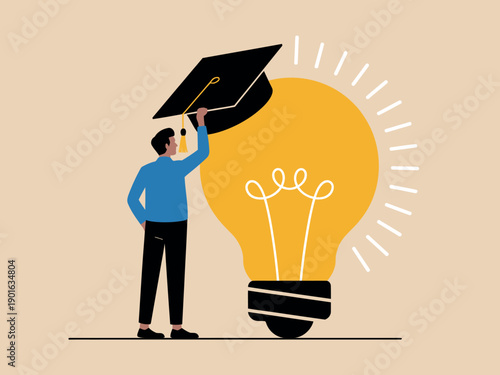 A man in a blue shirt and black pants holds a graduation cap next to a large yellow light bulb, symbolizing a bright idea for education.