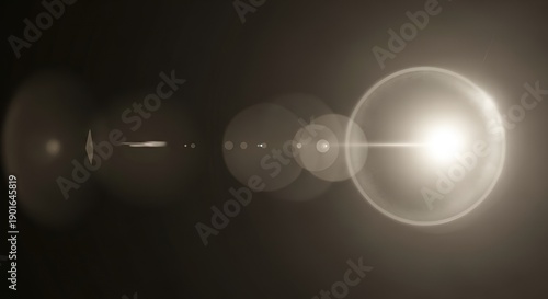 lens flare effect, bright light and circles on dark background
