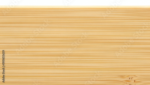 Close-up of parallel wooden grain. Bright lighting shows the textures and patterns of a wooden surface