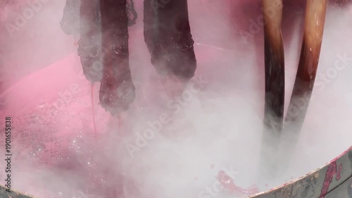 Dyeing fabric with lac to obtain natural colors using the ancient method of boiling in a hot pot.