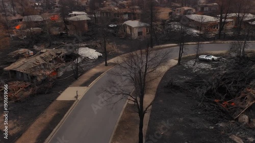 Aerial View of a Devastated Suburban Community After a Destructive Fire, Showing Homes Reduced to Rubble and Charred Landscapes in the Wake of a Catastrophic Disaster