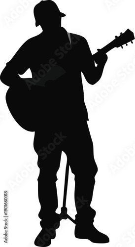 Silhouette Of A Street Musician Playing Guitar