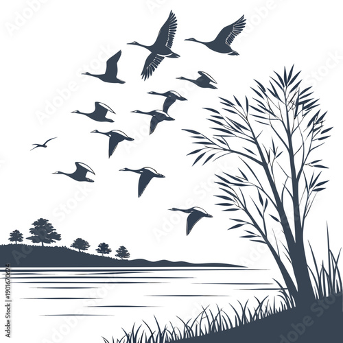 Dark blue silhouette of geese flying over lake and tree