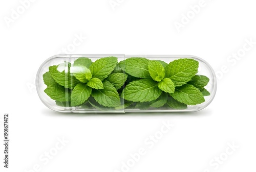 Green fresh peppermint leaves inside clear transparent supplement capsule isolated on white background 