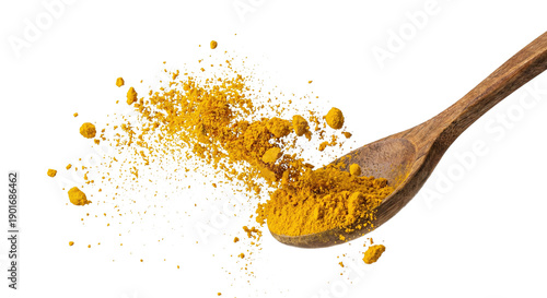 Bright Turmeric Powder On A Spoon In Kitchen Setting. Transparent Background, PNG Style