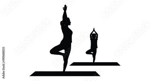 Silhouette of a mother and child practicing yoga poses together