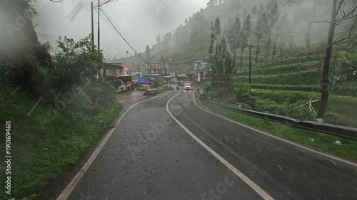 Misty Mountain Road in Heavy Fog and Rain