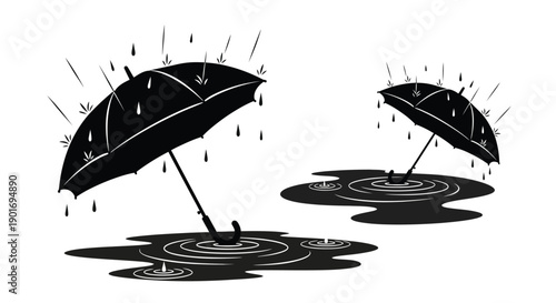Two black umbrellas shielding from rain with visible water ripples