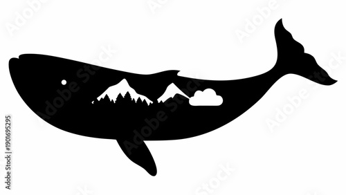Majestic whale silhouette with mountain landscape inside