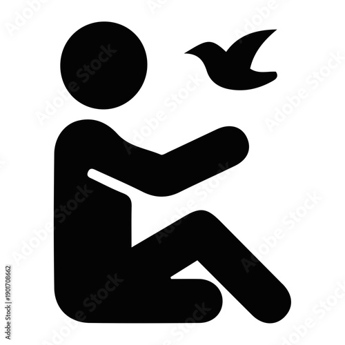 Person Kneeling with Bird in Hand.