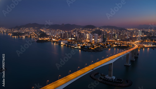 Illuminated Bridge and City Skyline at Night in Vitória, Brazil