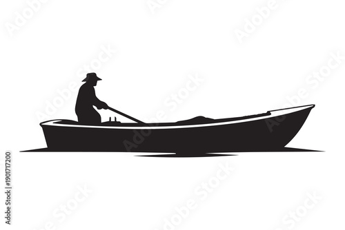 silhouette of a man in a boat