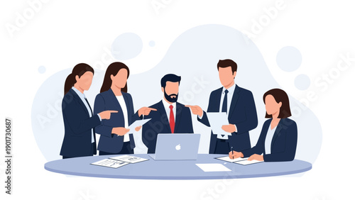 Diverse business team collaborating around a table with laptop and documents