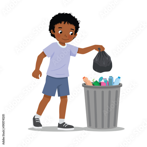 Little African boy throwing trash into recycle bin