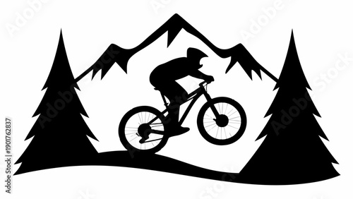 Mountain biker riding through scenic forest landscape with mountains