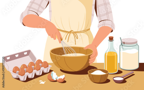 A person wearing an apron mixing ingredients in a bowl on a table with eggs, oil, and flour nearby.