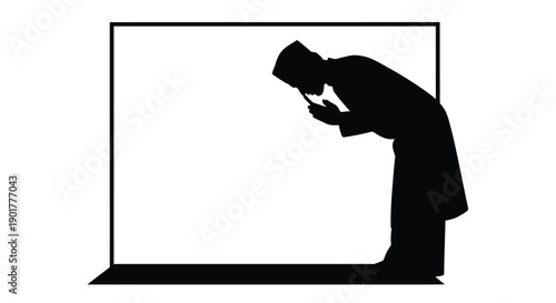 Man Praying and Reading Quran Silhouette