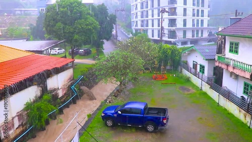 Wallpaper Mural Patong Phuket Thailand panorama with heavy monsoon rain storm clouds. Torontodigital.ca