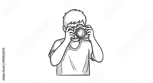 Young Boy Holding Camera Taking Picture.