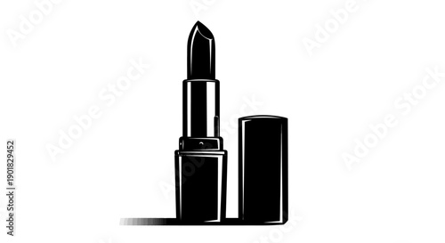 A black lipstick with its cap resting beside it on a white background.
