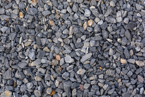 Gray gravel stone texture background, natural rock surface for construction