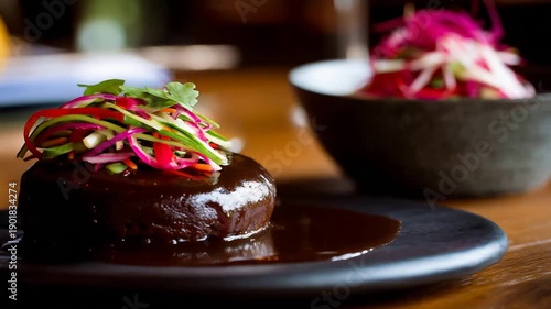 Wallpaper Mural Elegant Gourmet Dish with Rich Dark Sauce and Vibrant Julienne Vegetables in Restaurant Setting. Torontodigital.ca