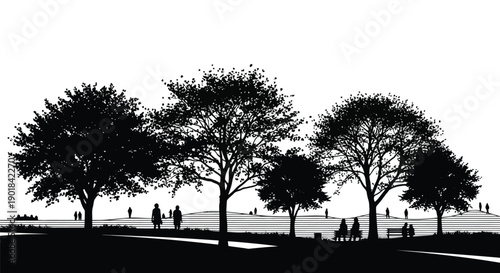 Silhouetted trees and figures against a bright sky at sunset