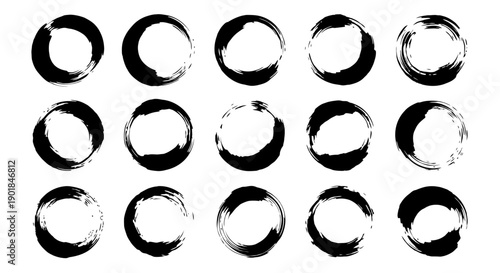 Hand-painted black circles on white background for design