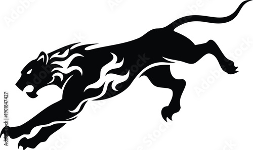 Majestic black silhouette of a powerful roaring big cat with tribal flame patterns leaping