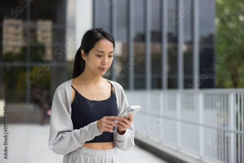Woman use cellphone at outdoor park Free Download Woman use cellphone at outdoor park - GFXLoad