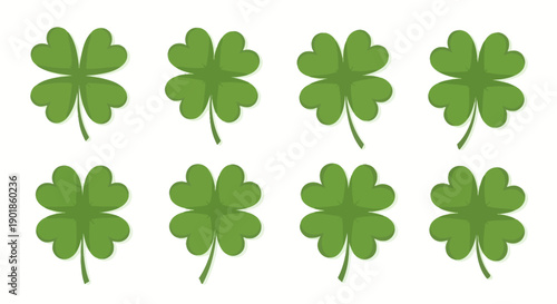 Collection of Green Four-Leaf Clovers on White Background - Symbol of Luck