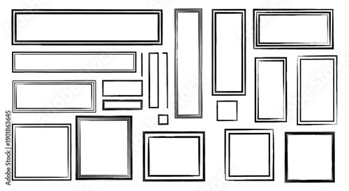 A collection of various empty picture frames of different shapes and sizes, arranged in a scattered pattern.