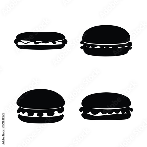 Four stylishly designed macarons arranged in a square formation on a plain background