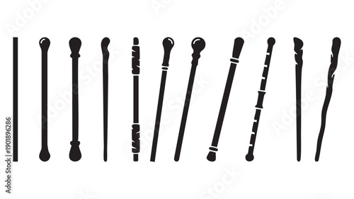 Set of fantasy staffs and wizard wands, magical implements, and ceremonial rods in silhouette, for sorcery and enchantment related graphic elements