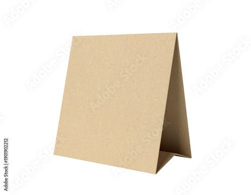 A blank, small, brown, triangular paper sign on a black background