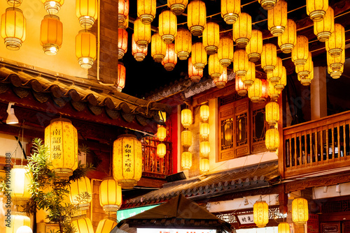 Fotografie Lanterns illuminating Dali Old Town at night, Yunnan, China