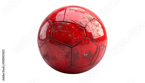 A worn red ball with polygonal panels against a black backdrop