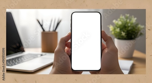 Hands Holding Smartphone With Blank Screen Near Office Supplies On Desk