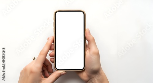 Woman Holding A Smartphone Device Against White Background Displaying Blank Screen