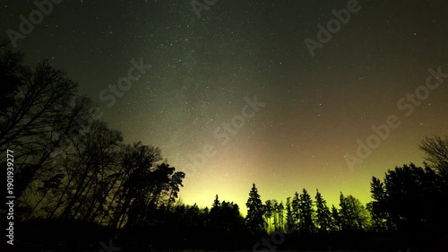 Night sky timelapse with Milky Way and Aurora Borealis. 4k landscape timelapse.