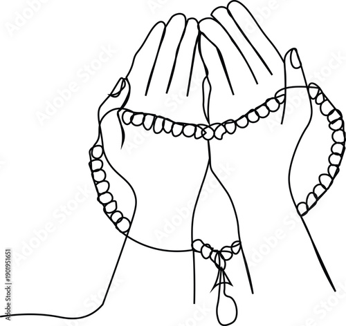 hand holding prayer beads during religious ceremony.