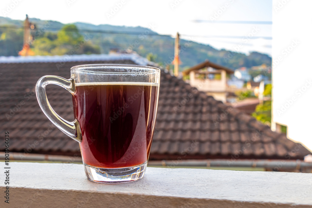 Fototapeta premium Black coffee with tropical landscape terrace balcony panorama view Thailand.