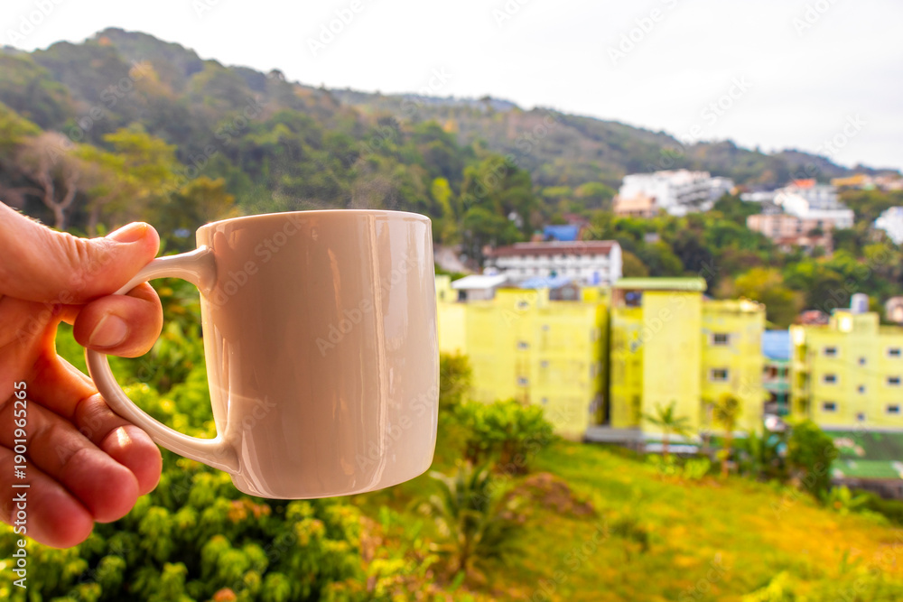 Fototapeta premium Black coffee with tropical landscape terrace balcony panorama view Thailand.