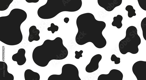 A seamless pattern of black and white cow spots, creating a classic and recognizable animal print texture.