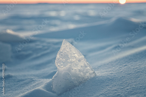 Close-up photo of real snow top view macro like sand dunes