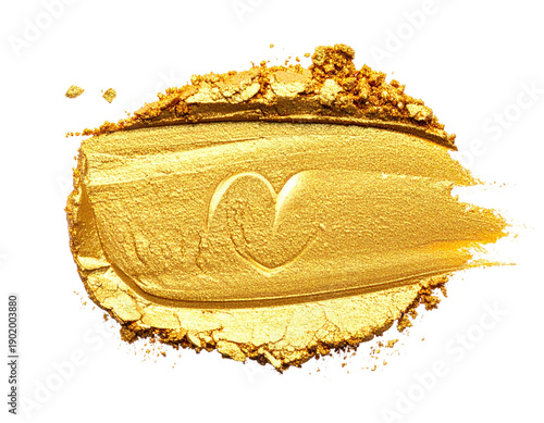 Swatch of shimmering gold makeup, textured, on black backdrop