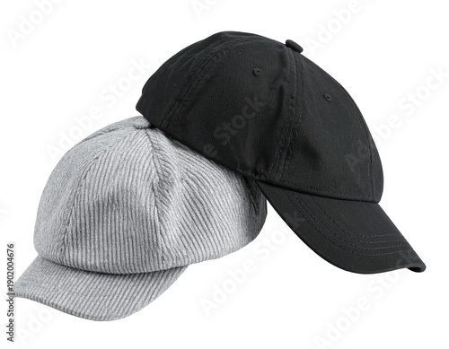 Two baseball caps, one corduroy and one solid black, stacked
