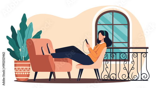 Young woman relaxing in a lounge chair by a window listening to music on her smartphone with headphones in a cozy room.