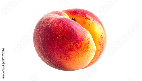 Close-up of a ripe peach isolated on a black background, showing vibrant colors