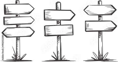 Hand drawn directional wooden signposts with blank signs and grass